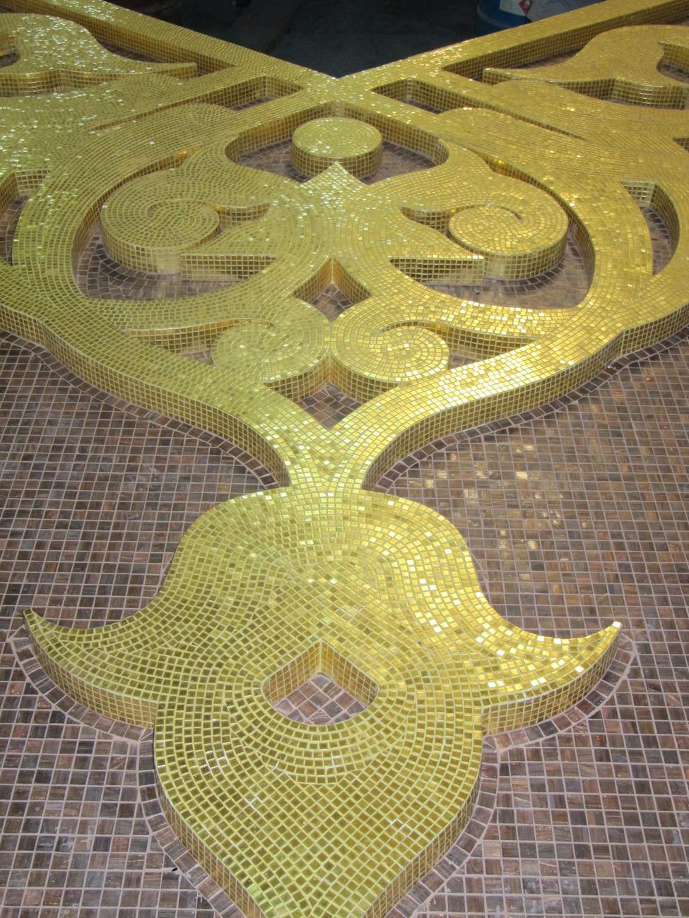 Large gold arabesque panel laid out flat